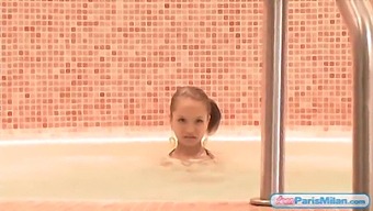 Teen Paris Milan Flaunts Her Body In A Bikini, Tempting You In The Jacuzzi